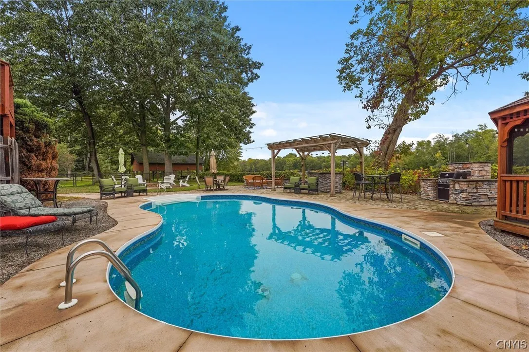 Patio with outdoor entertainment at rivers edge
