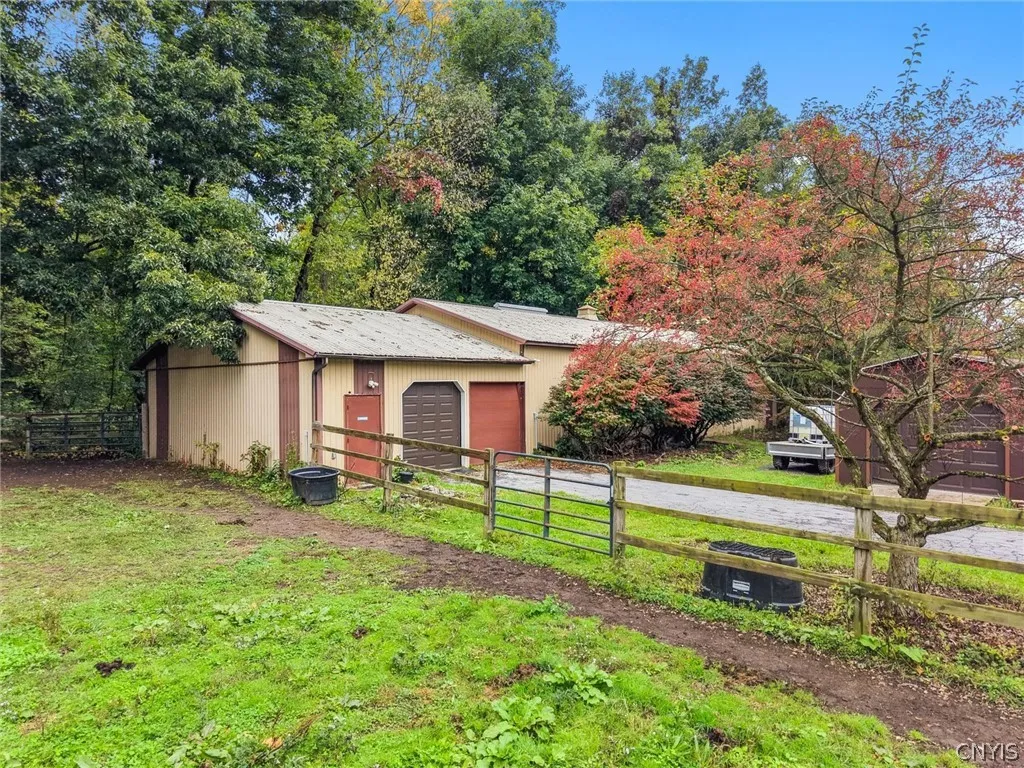 Detached horse barn and tack rooom with 2 bay garage
