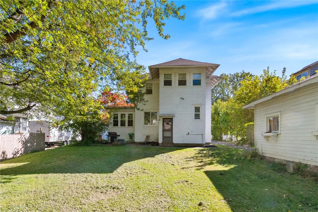 The rear view - there’s a patio with a firepit here!