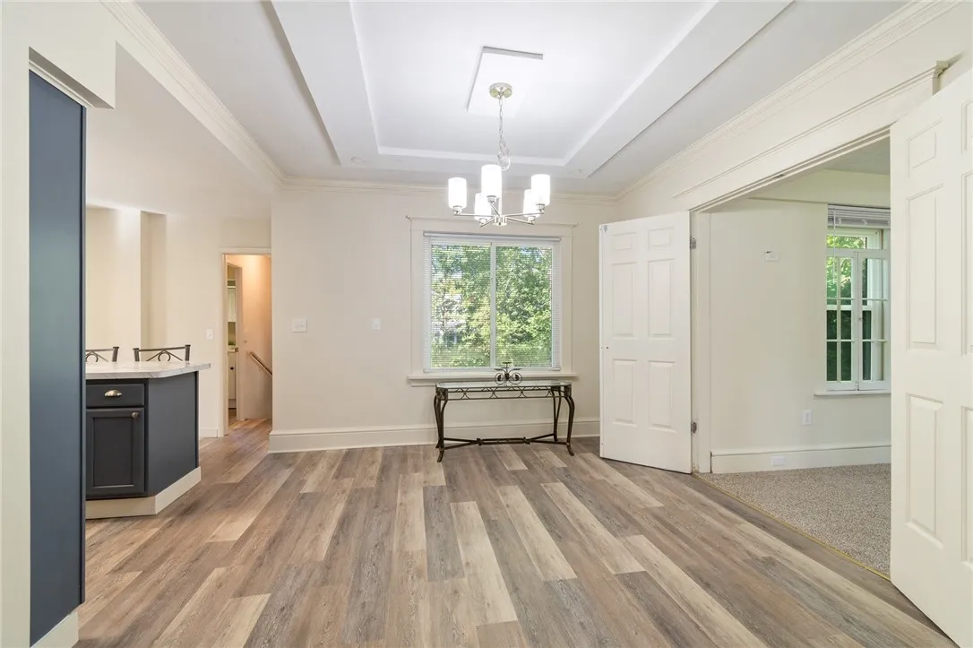 The dining room - has an adjacent room that could be used as a media room, library or even a first floor bedroom!