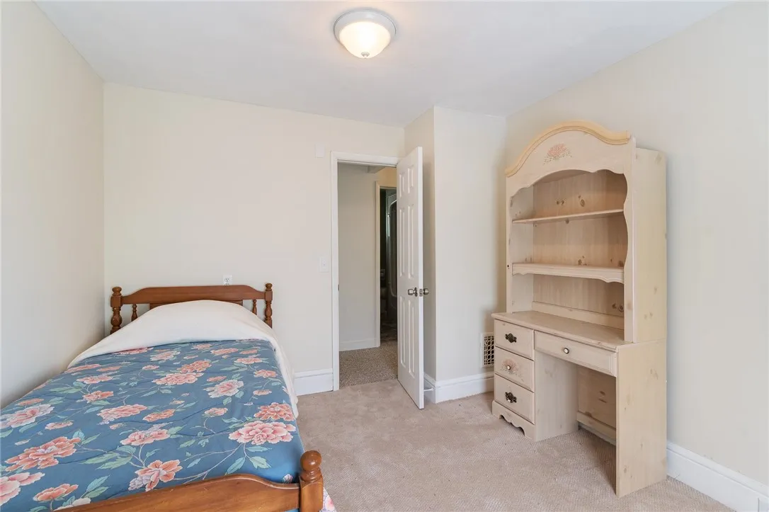 One of four bedrooms on the second floor - there are two full baths and a half bath/laundry room as well!