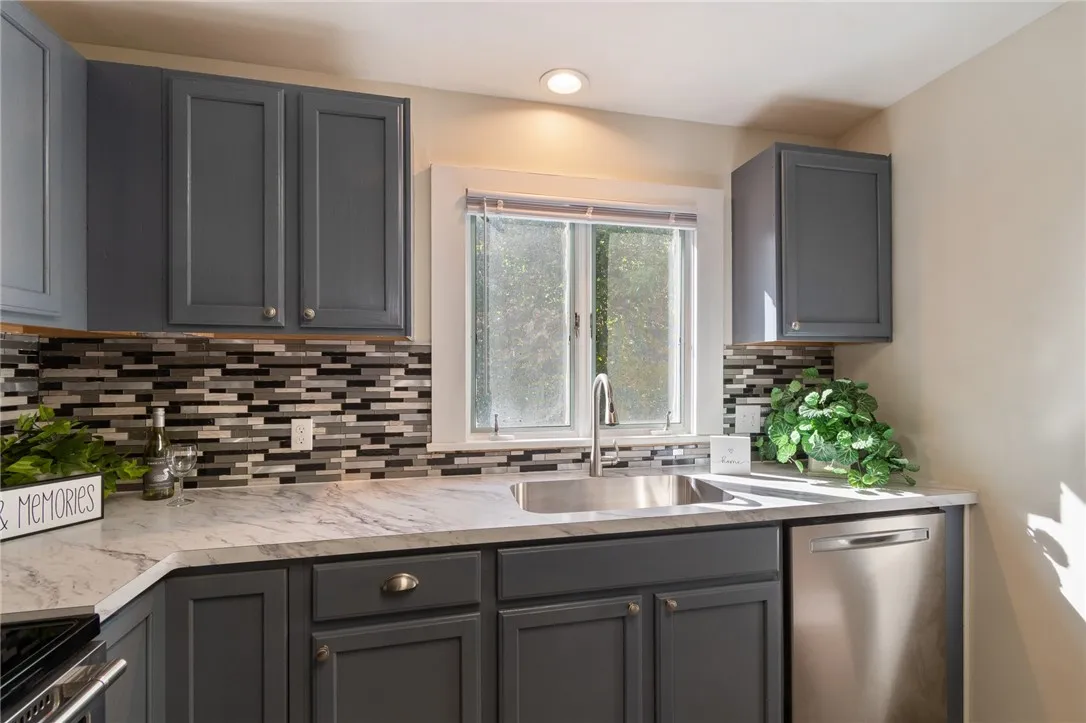 Expertly updated kitchen! Plenty of counter space and an ISLAND too!