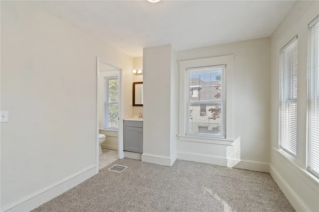 This second floor room has its own full bath- a great HOME OFFICE SPACE- maybe a gaming room- craft area too!