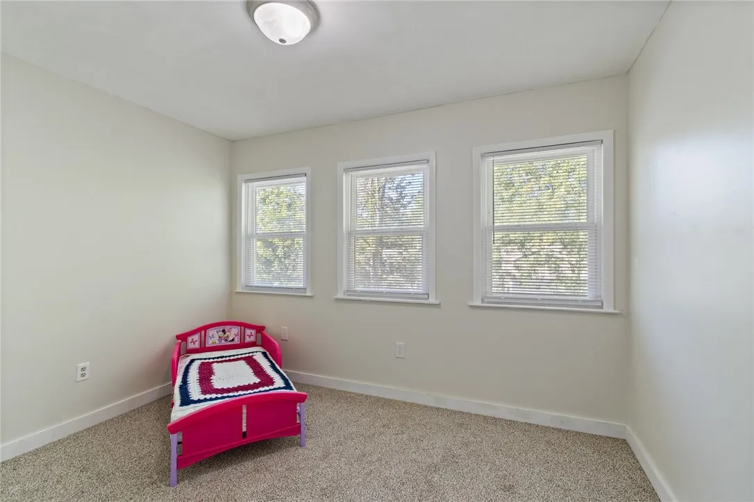 One of the four upstairs bedrooms- vinyl windows too