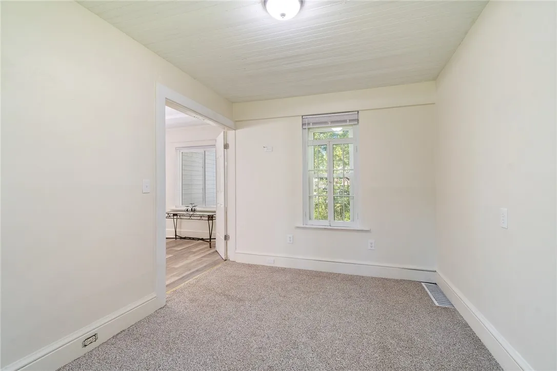  This BONUS room (off the dining area) can be a first floor bedroom- a media room- a library- whatever you choose!