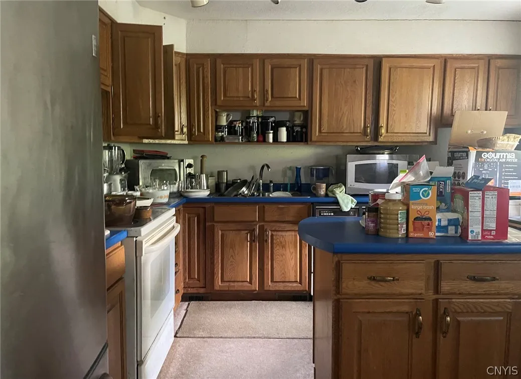 Kitchen with oak cabinets (currently set up for a house sale)