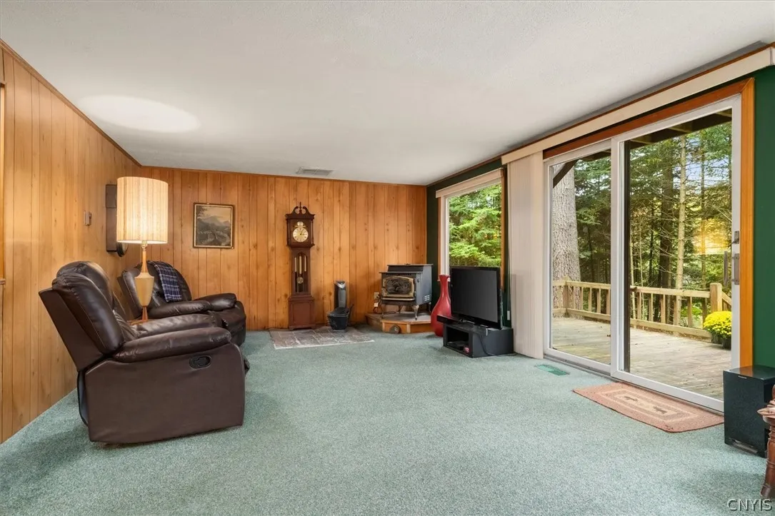Large living room with sliding doors to the deck.