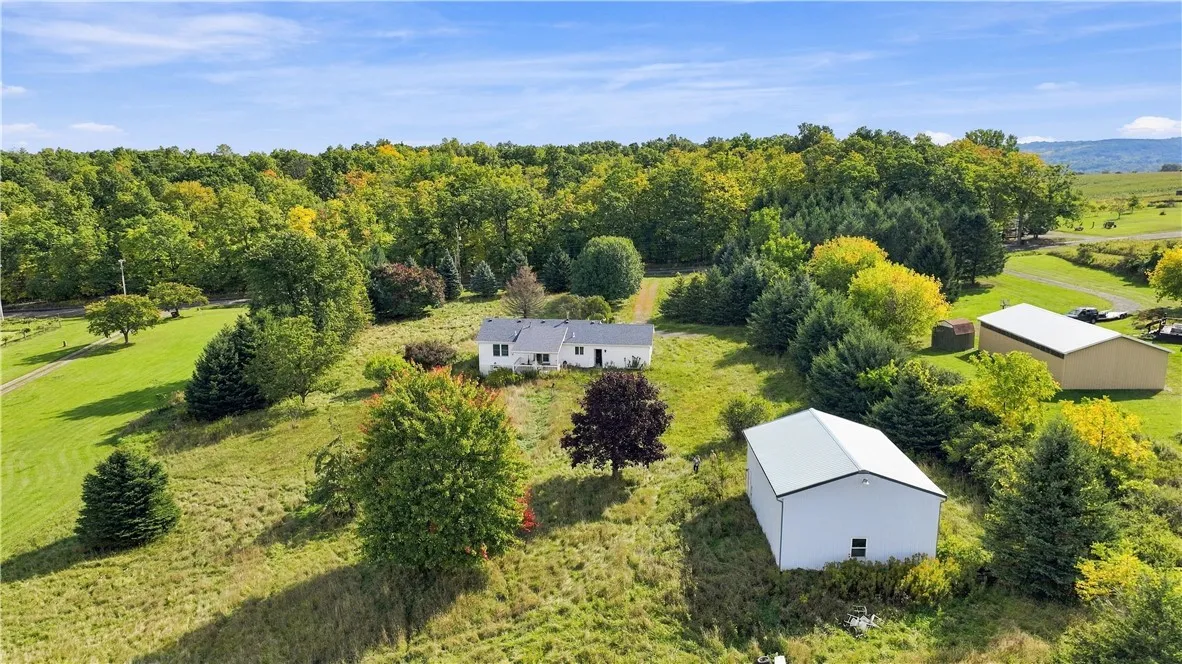 View from behind barn to road