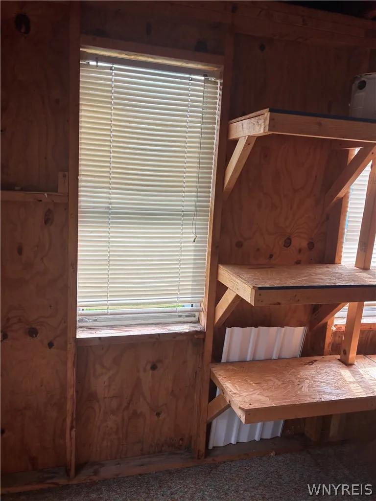 FRONT BEHIND BARN DOOR - UNHEATED STORAGE