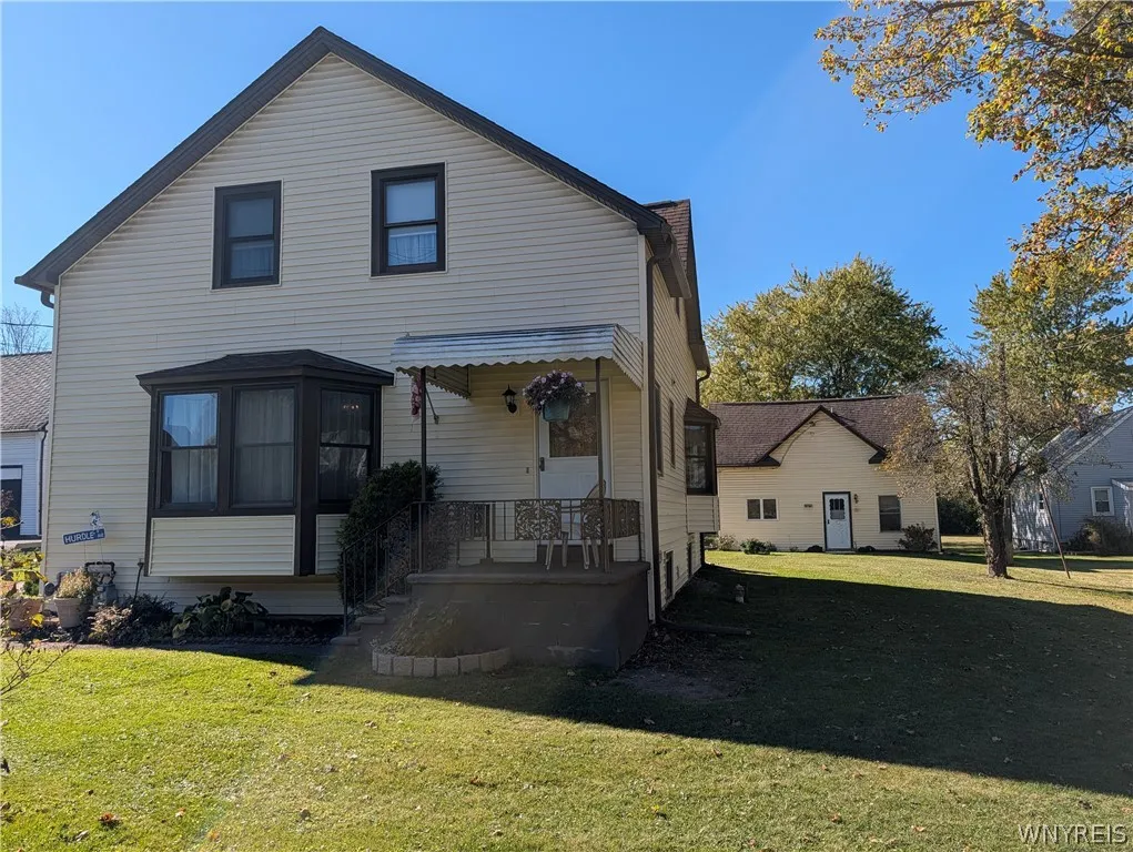 Two single family homes on one spacious lot.