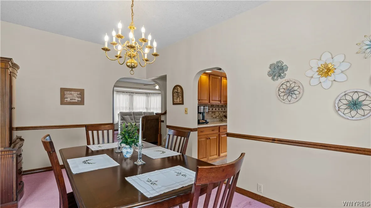 Classic chair rail and chandelier are sweet details