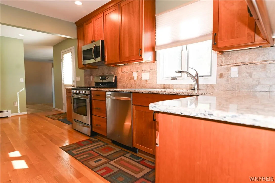 Kitchen-Far room is family room with half bath