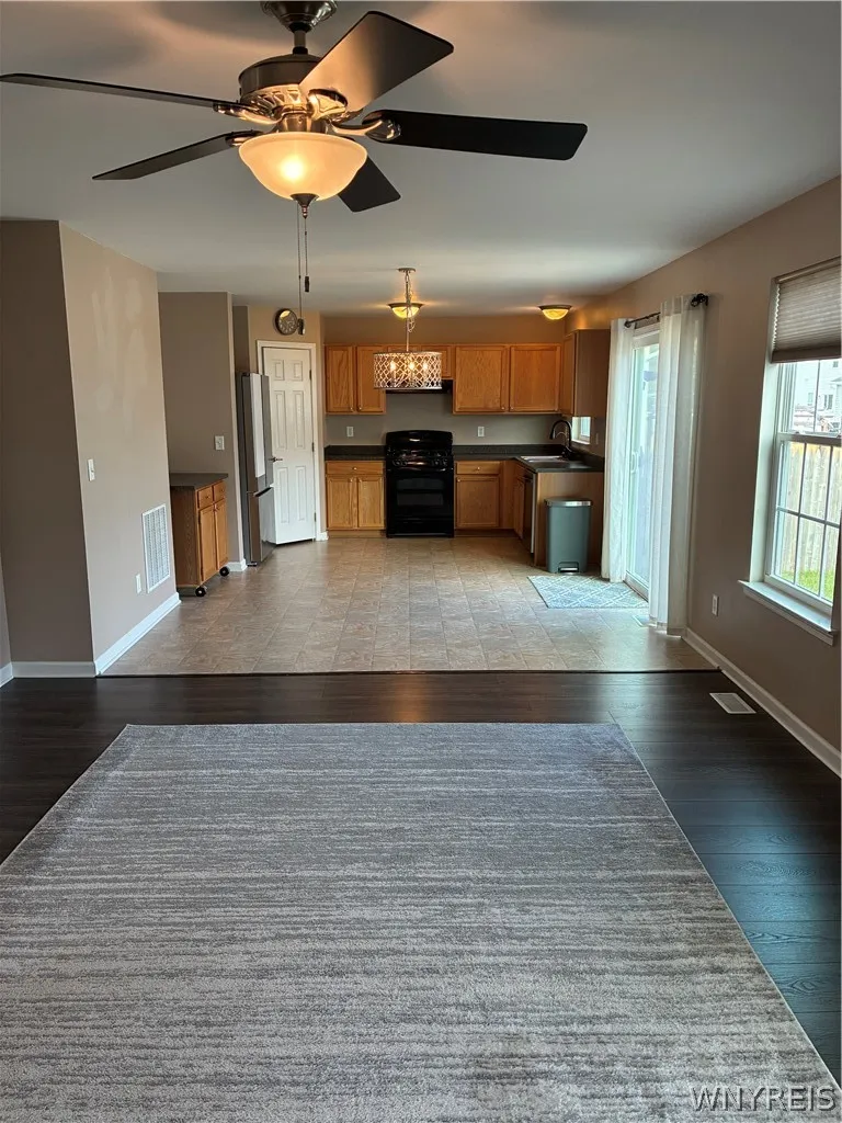 OPEN FAMILY ROOM/DINETTE/KITCHEN