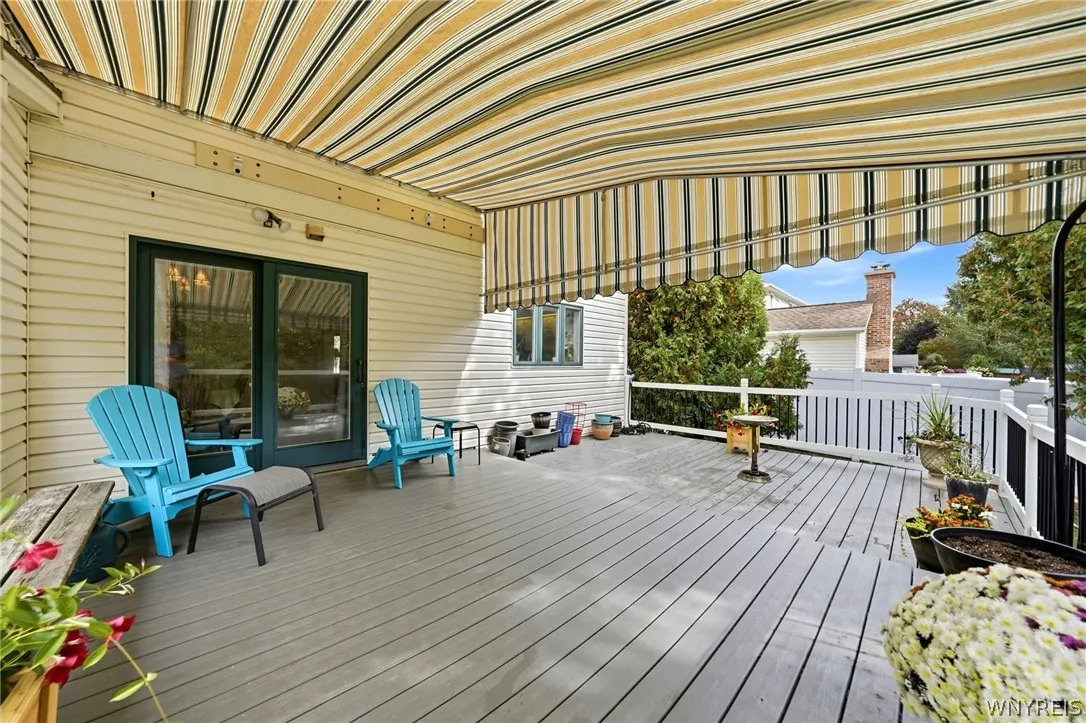 Step out from kitchen onto 2-tier deck
