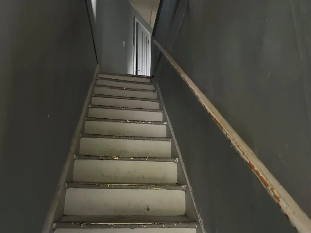 Stairs to bedrooms and bath
