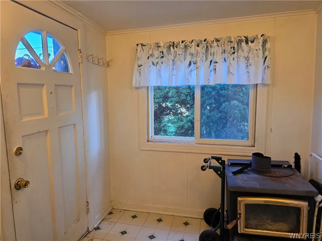Front Entry
Woodburning stove will be removed before closing