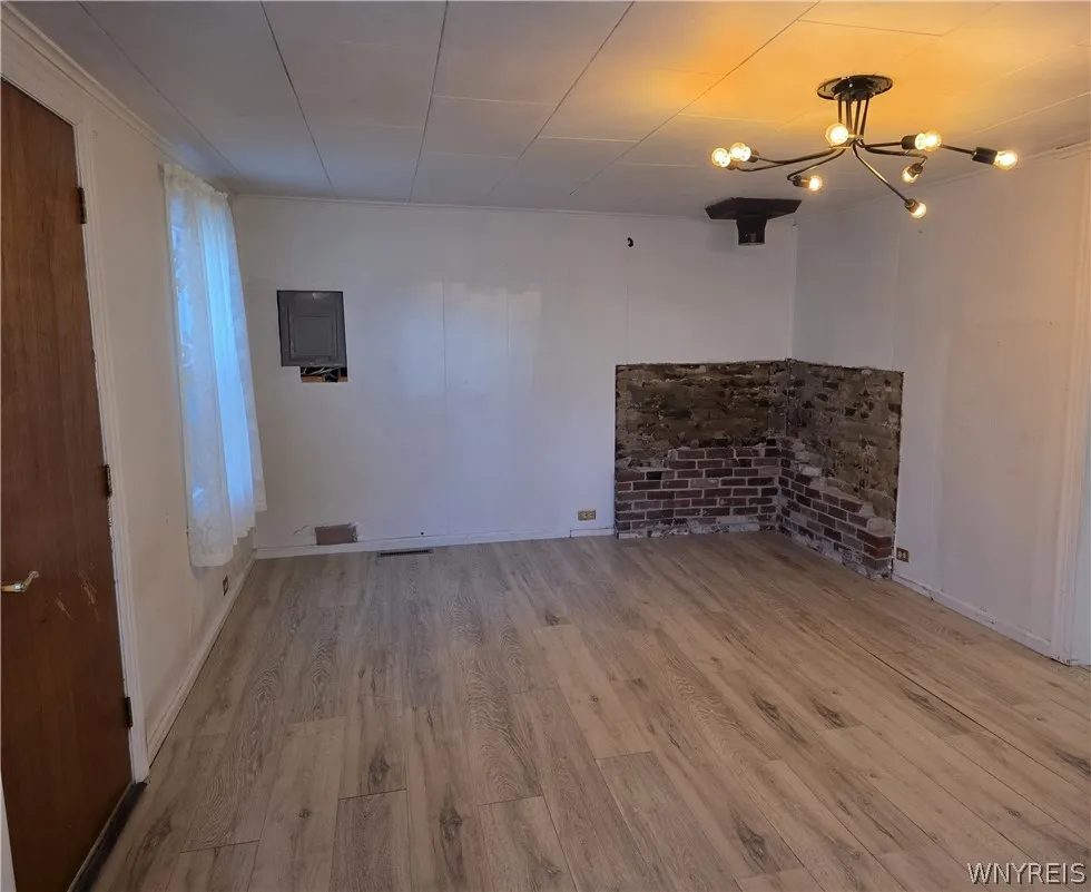 Living room/wood burning stove was remove but owner didn't  get to finish plans due to job relocation