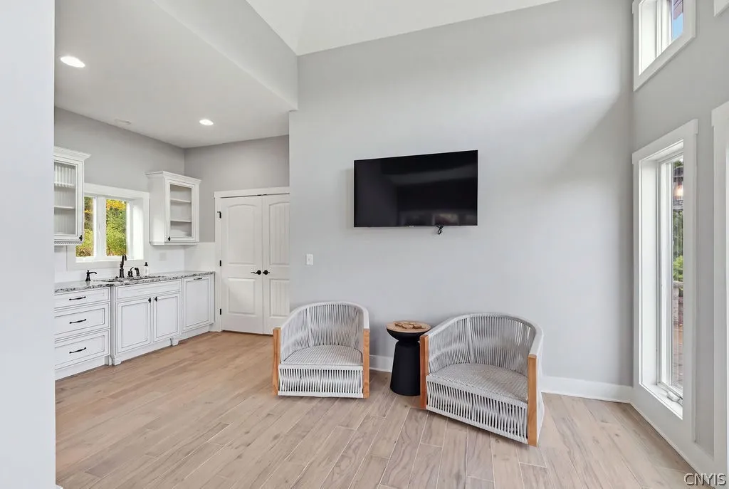 The Pool house has a kitchenette, AC, lounge area and a full bath