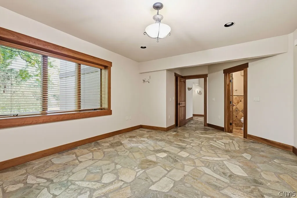 The third bedroom on the lower level has a private en-suite bathroom