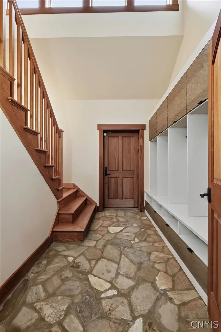  
And a mud room with stairs to the loft