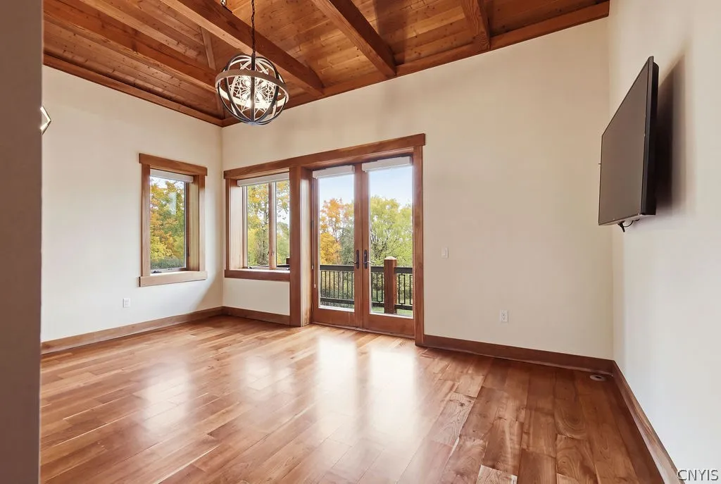 Main Level primary suite with privacy balcony