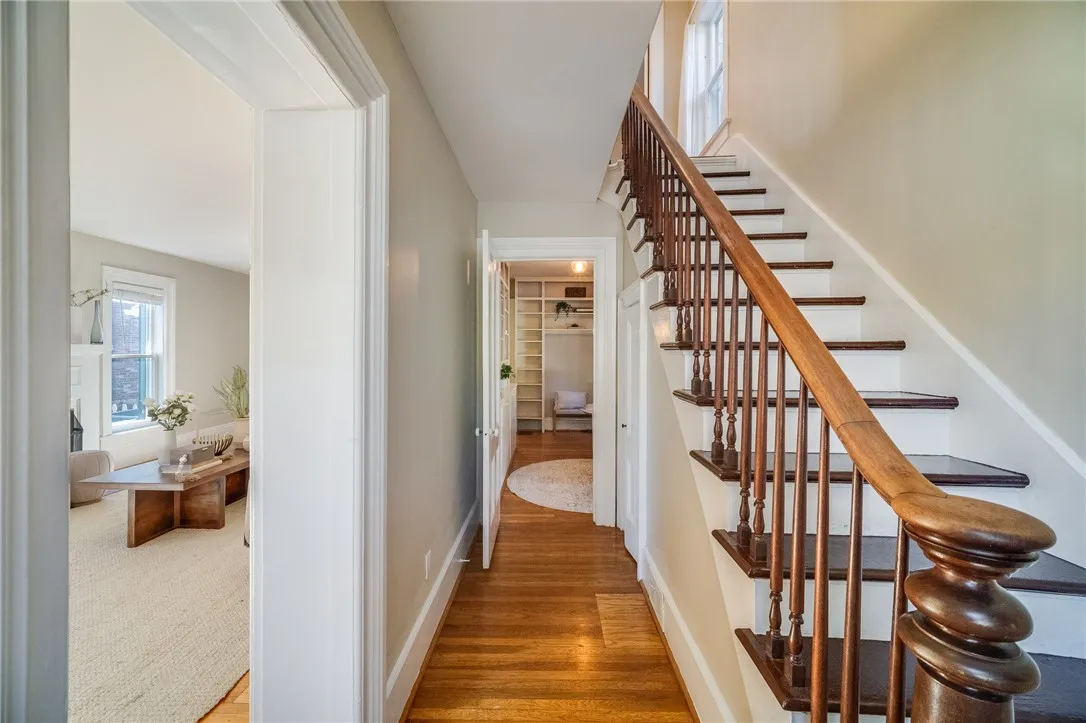 Grand wooden staircase welcomes you