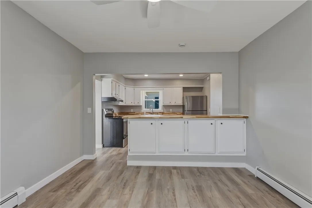 Looking to the kitchen, from the dining room