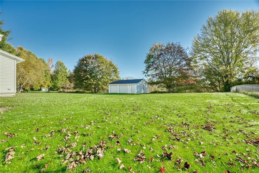 oversize yard with an extra outbuilding/garage space!