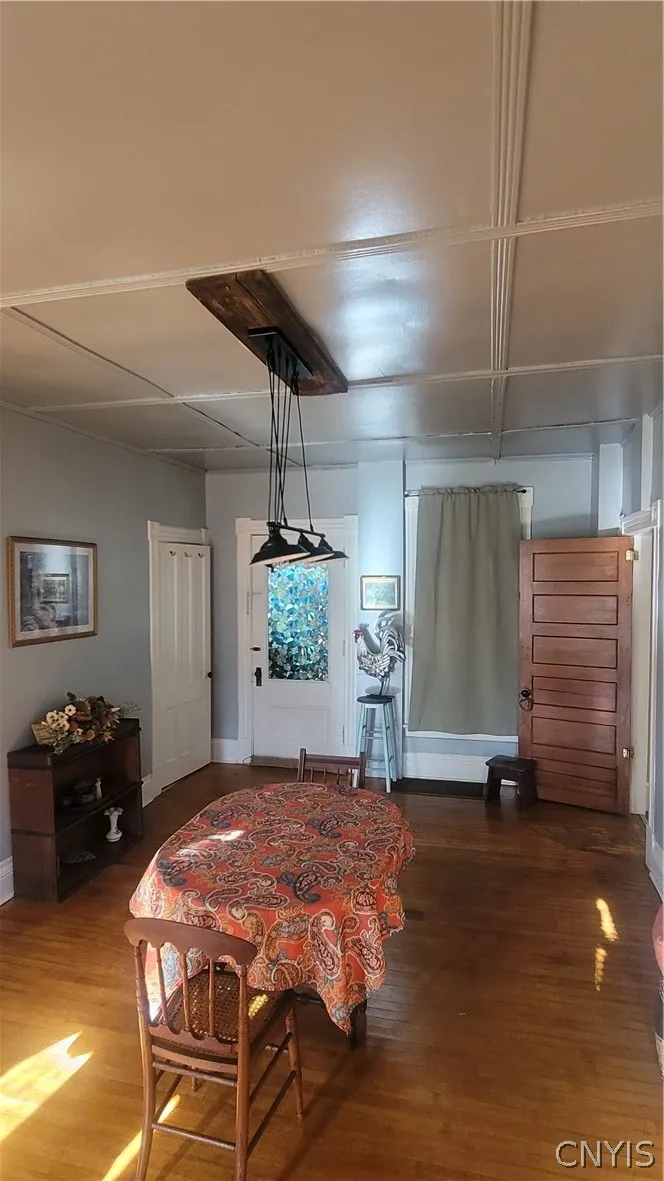 Dining room and half bath at White door on left side