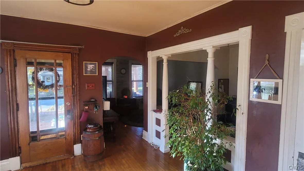 White trim leads into Den/office area and living room