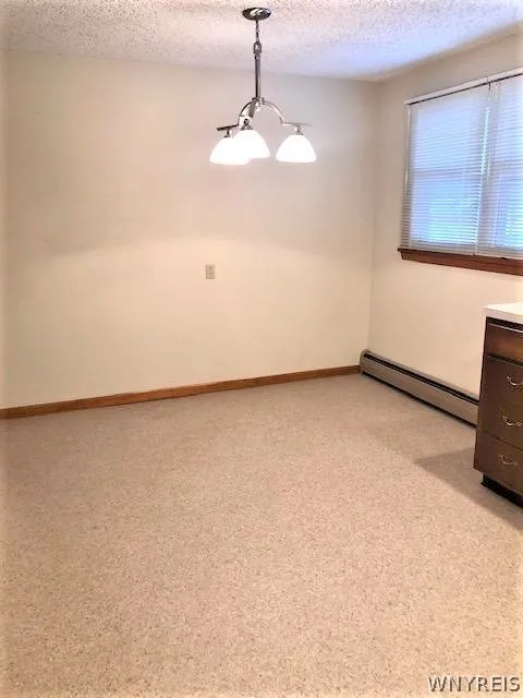 Eating area off kitchen.