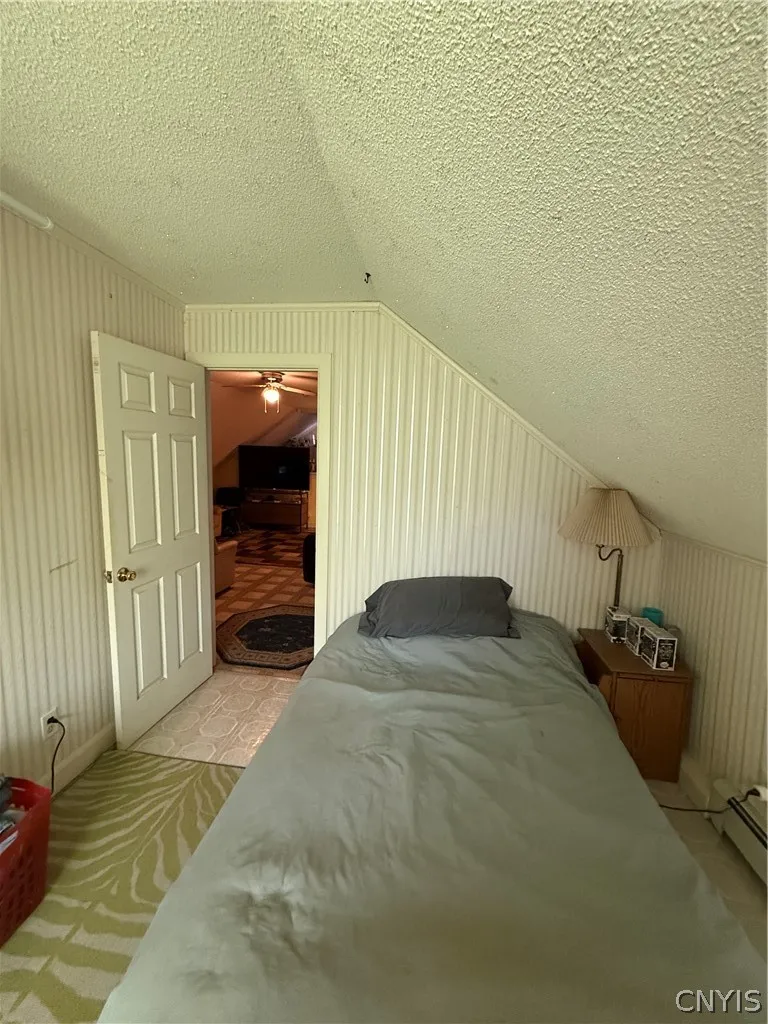 one of two apartment bedrooms
