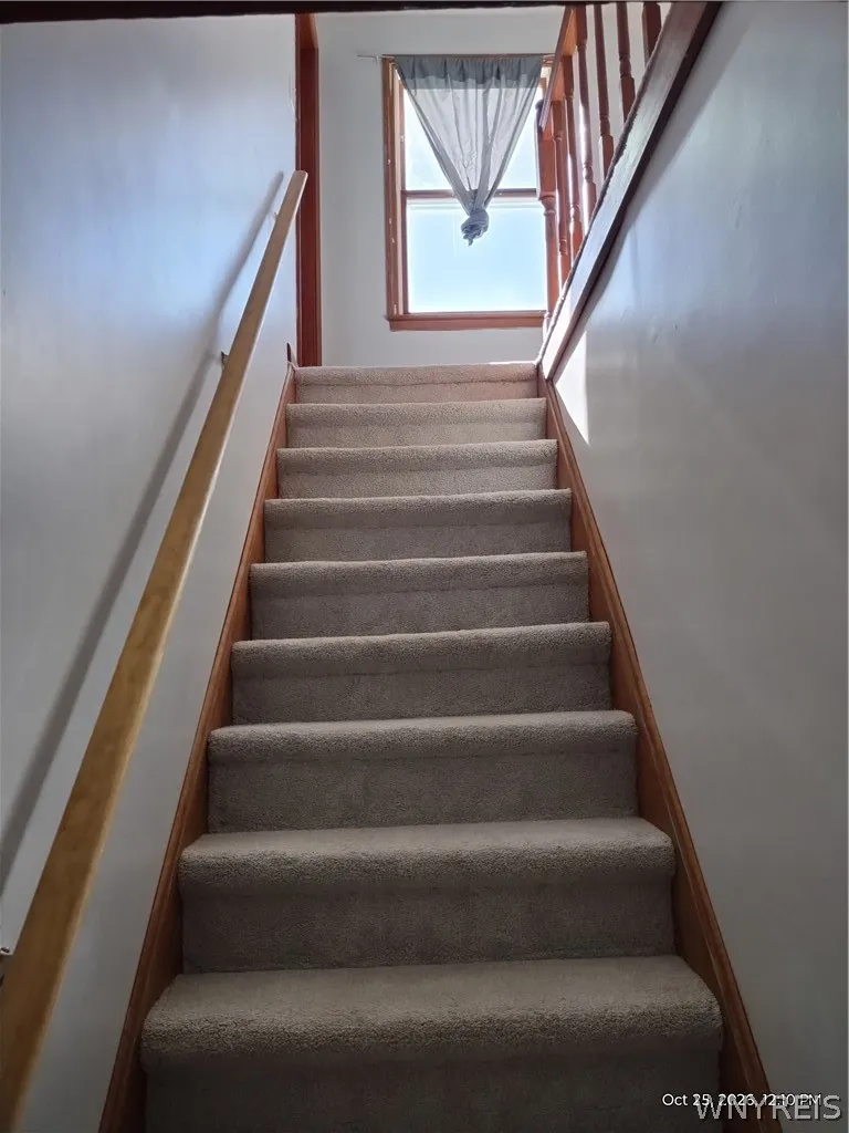 Stairs off Dining room to 2nd floor