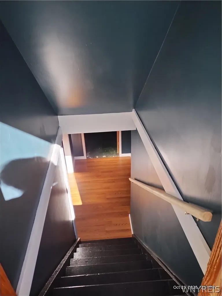 Stairs off kitchen to basement