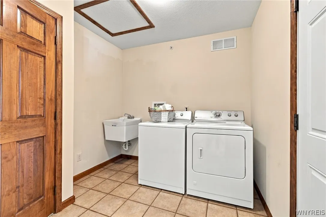 Pocket door to laundry & access to garage