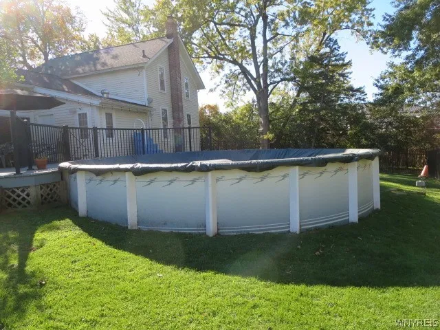 Above ground pool with a brand new liner & filter to enjoy on those hot summer days!