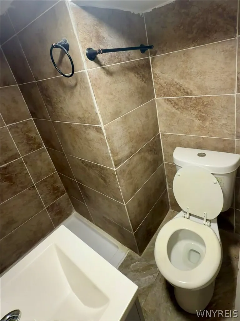 Basement bathroom with walk in shower