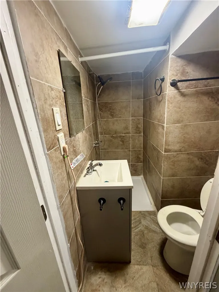 Basement bathroom with walk in shower