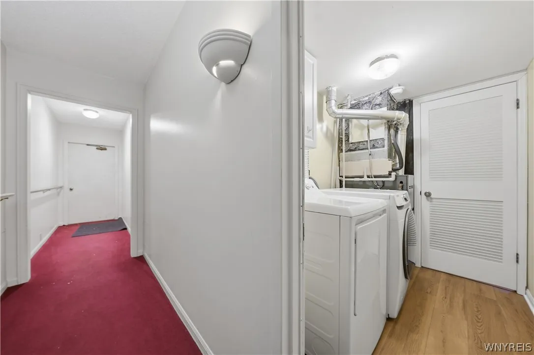 Back hall off of Laundry room leads to covered garage