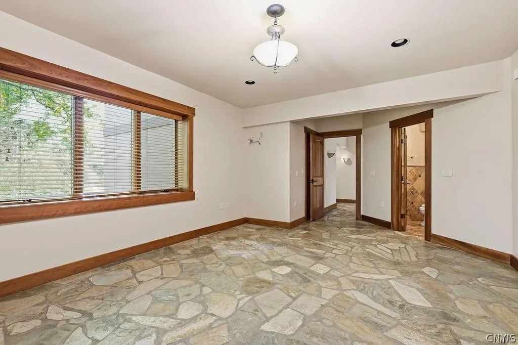 Third bedroom on lower level with en-suite bathroom