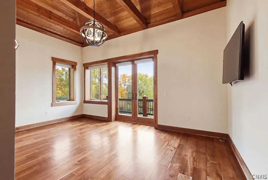 Main level primary suite with privacy balcony