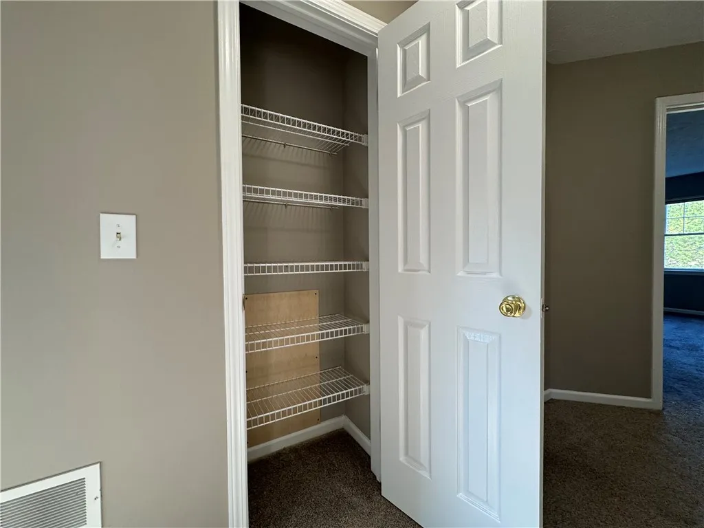 Typical linen closet in upstairs hallway