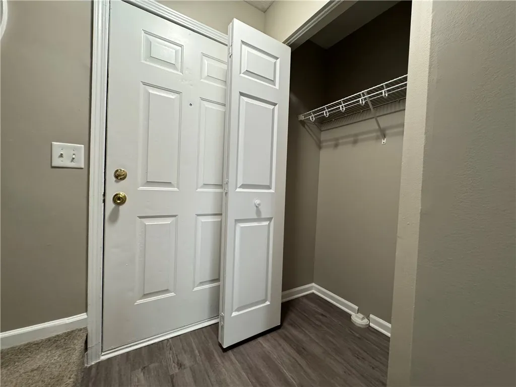 View of typical front hall closet near front door