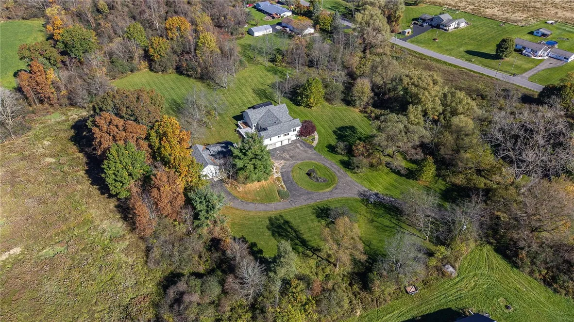 Great aerial view of the 2 houses on the 11 acres