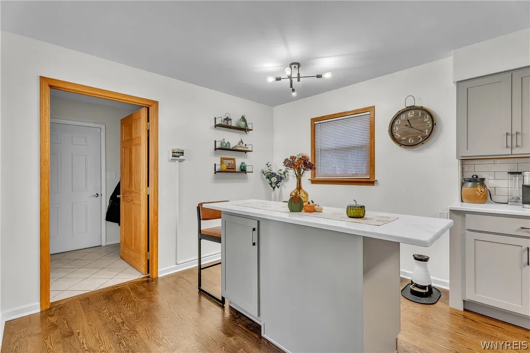 This door leads to the 1st floor laundry and attached garage.