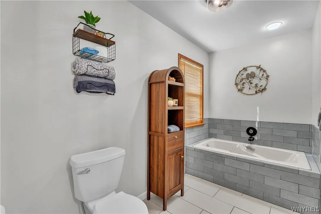 The deep soaking tub in the primary bath in addition to the walk in shower is a nice added feature.