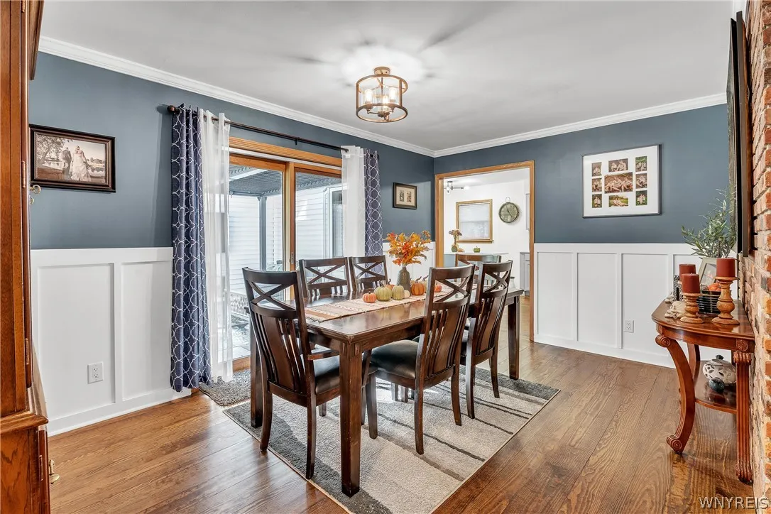The sliding doors here lead to a new tex deck overlooking the back yard and woods.