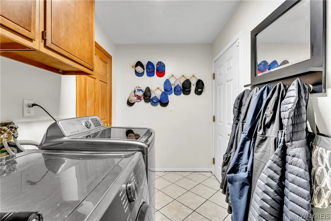 Laundry/mud room with entry from the kitchen and the garage.