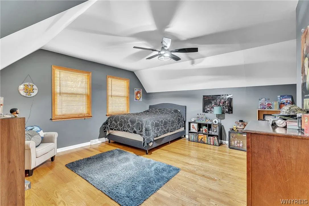 First of two very generously sized bedrooms located on the second floor. Note that there are more beautiful hardwood floors throughout this level.