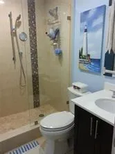 Large step in shower glass shower door